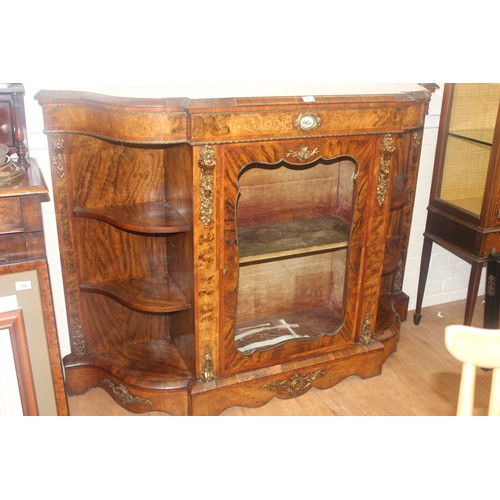 261 - A Victorian walnut credenza with gilt-metal mounts and oval porcelain medallion, the central glazed ... 