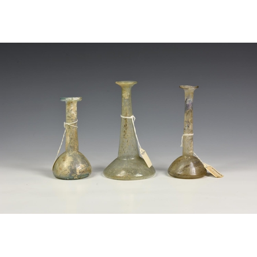 187 - Ancient Artifacts - Three unguentarium Roman glass vessels, circa 2nd ~ 3rd Century A.D., each havin... 