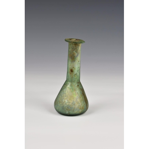 189 - A Roman iridescent pale green glass unguentarium, 1st-2nd century AD, with flat, everted rim, slende... 