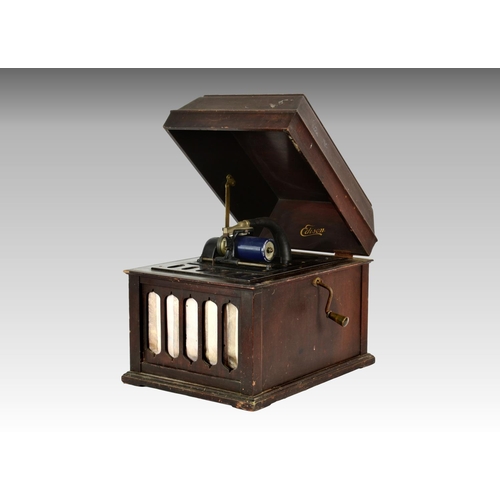 208 - A mahogany cased Edison phonograph, having front shaped grill and built in horn to carcass, 15in. (3... 