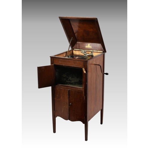 210 - A mahogany cased free standing cabinet gramophone by Academy, having two sets of hinged doors to fro... 