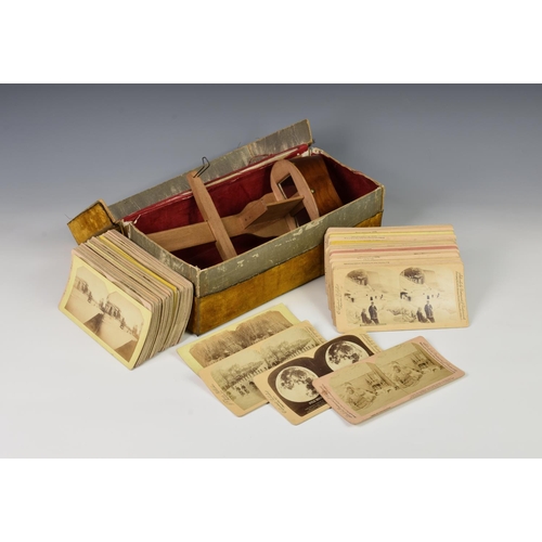 225 - A stereoscopic viewer and quantity of cards, to include many comical scenes comprising of five by Li... 