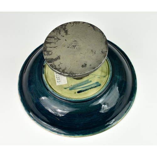 12A - A Moorcroft Tudric tazza in Eventide pattern, c.1920, tubelined and glazed, impressed 'Made in Engla... 