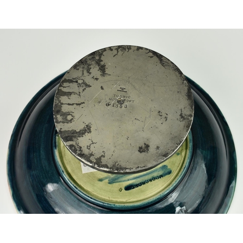 12A - A Moorcroft Tudric tazza in Eventide pattern, c.1920, tubelined and glazed, impressed 'Made in Engla... 