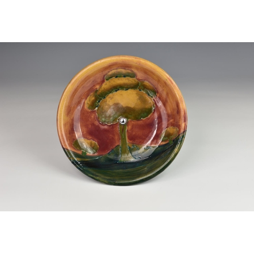 12A - A Moorcroft Tudric tazza in Eventide pattern, c.1920, tubelined and glazed, impressed 'Made in Engla... 