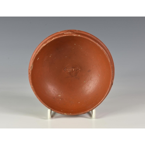 186 - A Roman Arretine red slip Terra Sigillata cup or dish, with accompanying collectors label ' Augustan... 
