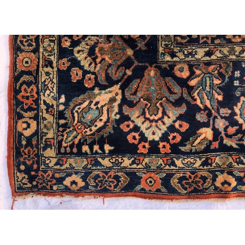 288 - An antique Persian carpet, probably 19th or early 20th century, with all over floral, vase and folia... 