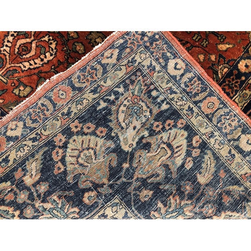 288 - An antique Persian carpet, probably 19th or early 20th century, with all over floral, vase and folia... 