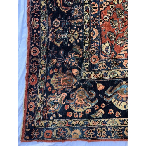 288 - An antique Persian carpet, probably 19th or early 20th century, with all over floral, vase and folia... 