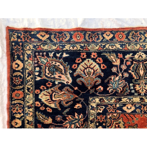 288 - An antique Persian carpet, probably 19th or early 20th century, with all over floral, vase and folia... 