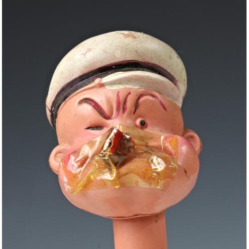 11 - A celluloid windup clockwork Popeye with original box, 'King Features Synd. 1929', damage to Popeye'... 