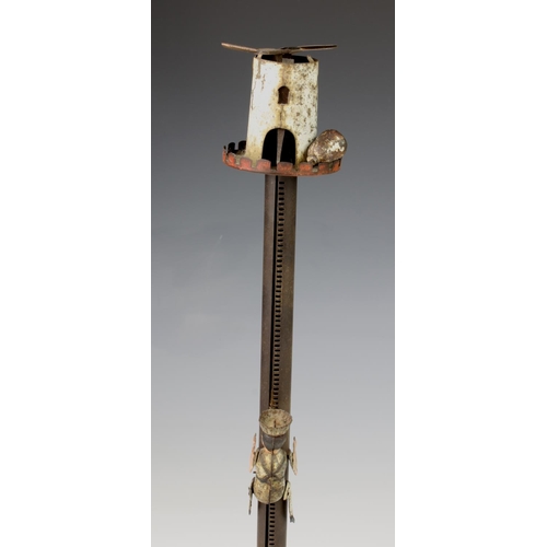 121 - A Lehmann tinplate clockwork beetle, c.1885, having moving legs and wings (working), together with a... 
