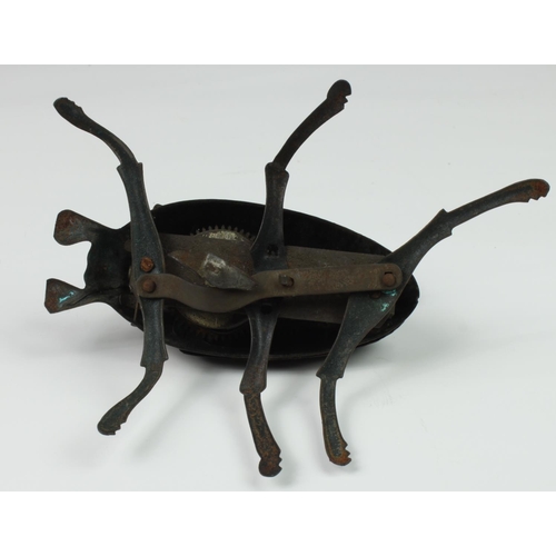 121 - A Lehmann tinplate clockwork beetle, c.1885, having moving legs and wings (working), together with a... 