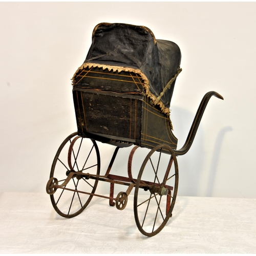 145 - A late 19th to early 20th century doll stroller rickshaw pram, of wooden and metal construction with... 