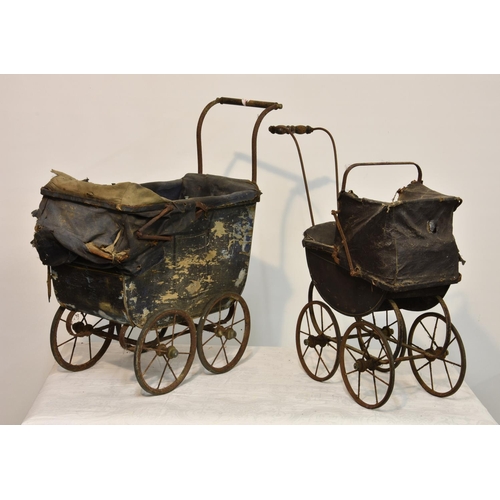 149 - Three late 19th to early 20th century doll's prams of varying sizes, requiring restoration, showing ... 