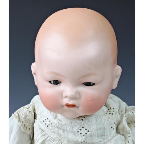 26 - Four Armand Marseille bisque head dolls, the first - impressed 300n, DRGM 2467, with weighted blue e... 