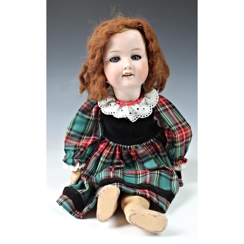 26 - Four Armand Marseille bisque head dolls, the first - impressed 300n, DRGM 2467, with weighted blue e... 