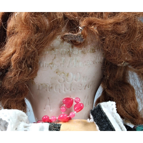 26 - Four Armand Marseille bisque head dolls, the first - impressed 300n, DRGM 2467, with weighted blue e... 