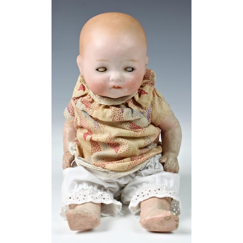 26 - Four Armand Marseille bisque head dolls, the first - impressed 300n, DRGM 2467, with weighted blue e... 