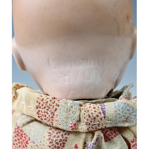 26 - Four Armand Marseille bisque head dolls, the first - impressed 300n, DRGM 2467, with weighted blue e... 