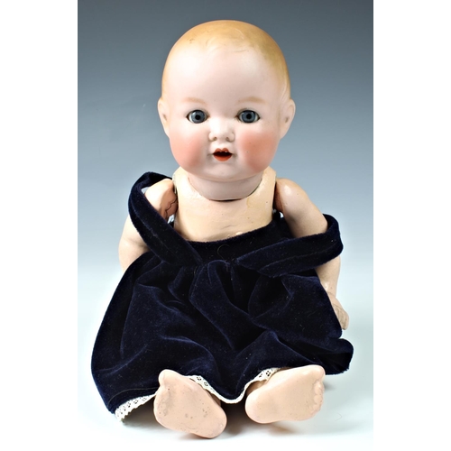 26 - Four Armand Marseille bisque head dolls, the first - impressed 300n, DRGM 2467, with weighted blue e... 
