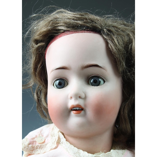 27 - A Kammer & Reinhardt / Simon & Halbig bisque head doll, German c.1910, with brown glass eyes, painte... 