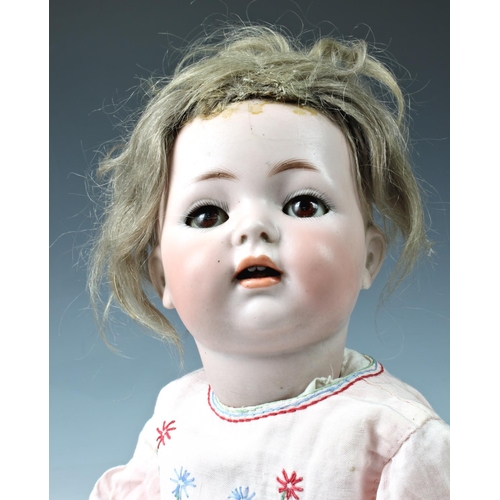 27 - A Kammer & Reinhardt / Simon & Halbig bisque head doll, German c.1910, with brown glass eyes, painte... 