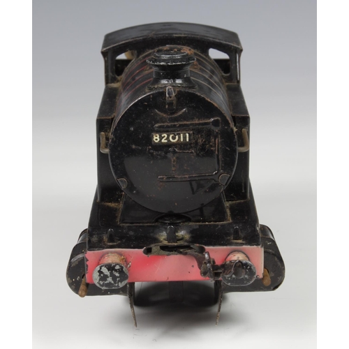 43 - A Hornby O Gauge type 40 tank loco, 0-4-0, BR lined black 3 82011, (mechanism appears to work, some ... 