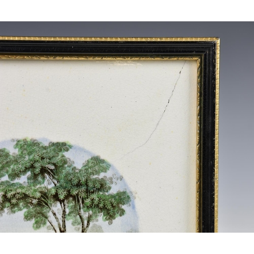 5152 - A 19th century transfer printed ware plaque, the hand coloured decoration depicting a town river lan... 