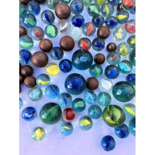 66 - A large collection of vintage marbles,