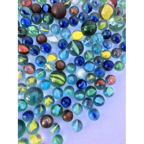 66 - A large collection of vintage marbles,