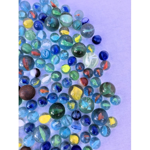 66 - A large collection of vintage marbles,