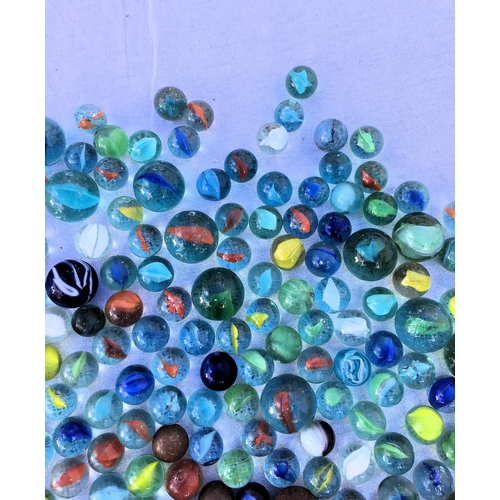 66 - A large collection of vintage marbles,
