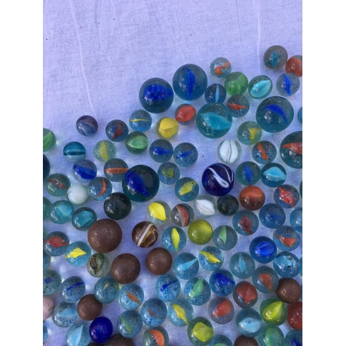 66 - A large collection of vintage marbles,
