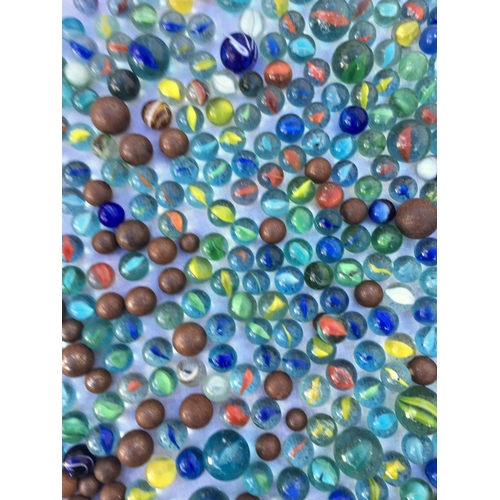 66 - A large collection of vintage marbles,