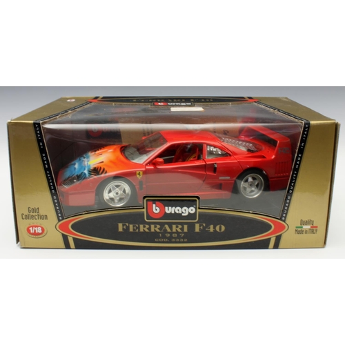 7 - A collection of four 1/18 scale precision diecast boxed model cars by Bburago, Gold Collection - com... 