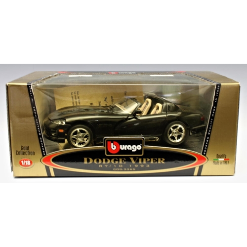 7 - A collection of four 1/18 scale precision diecast boxed model cars by Bburago, Gold Collection - com... 