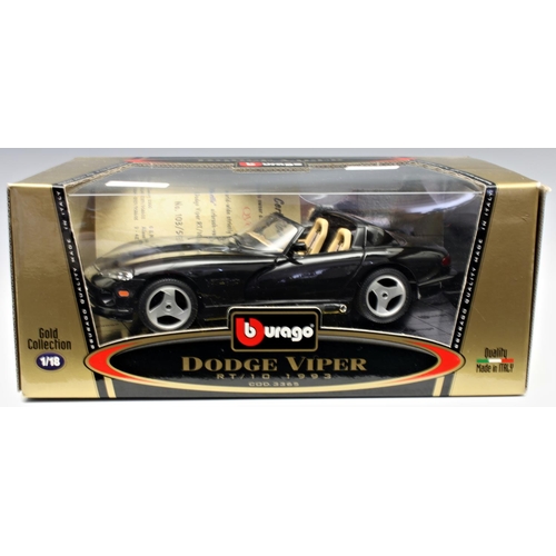 7 - A collection of four 1/18 scale precision diecast boxed model cars by Bburago, Gold Collection - com... 