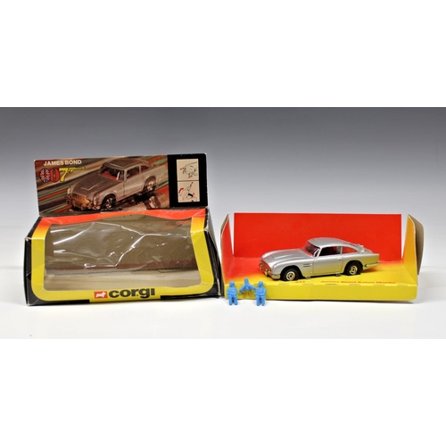 308 - Corgi - a boxed 1:36 scale Corgi 271 James Bond Aston Martin in Red / Orange Window box, two figures... 