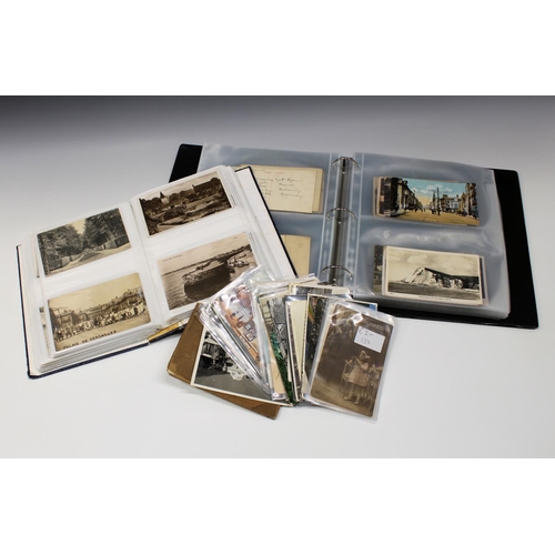 311 - A collection of postcards to include two albums and some loose.
