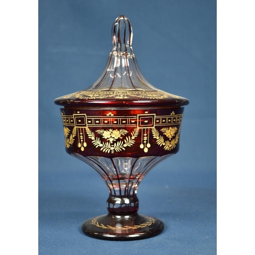 318 - A Victorian ruby flash covered vase with gilt decoration.,
