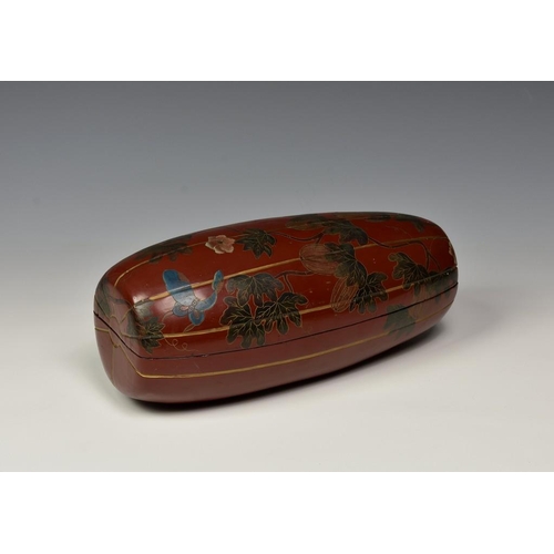 320 - *** WITHDRAWN ***  An Oriental red lacquer box fashioned as a gourd, the lidded box adorned with a b... 