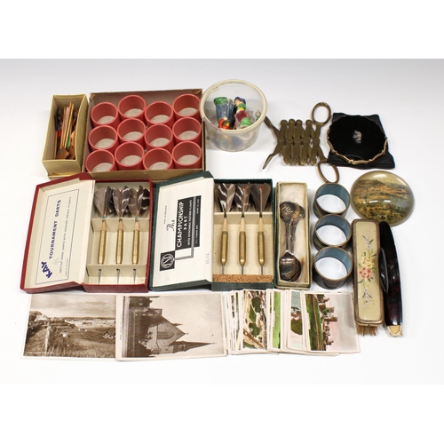 332 - A rummage tray of collectables, comprising two boxed sets of tournament feather darts; three Chinese... 