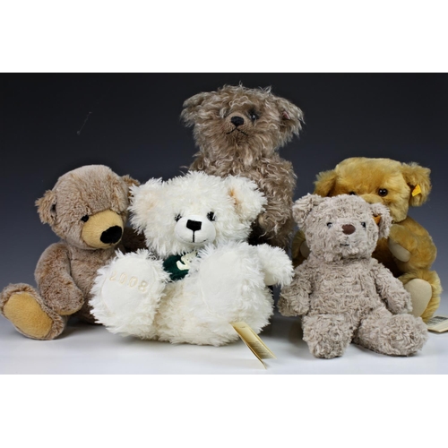 344 - Steiff Bears - A collection, each with buttons and tags in ears, comprising a fully jointed long hai... 