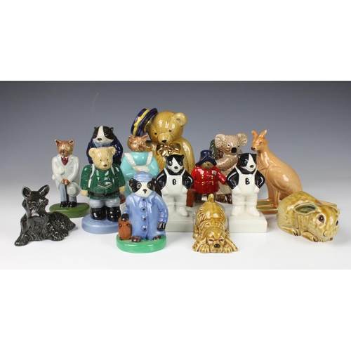 354 - Wade - A collection of various figurines, comprising a Paddington from 'The Camtrak Limited Edition ... 