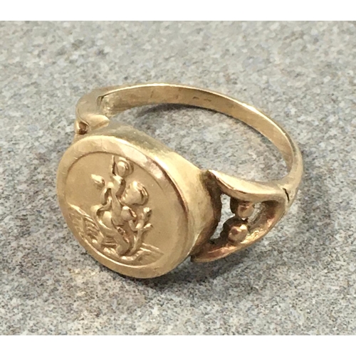 360 - A 9ct yellow gold St. Christopher style ring, size L.