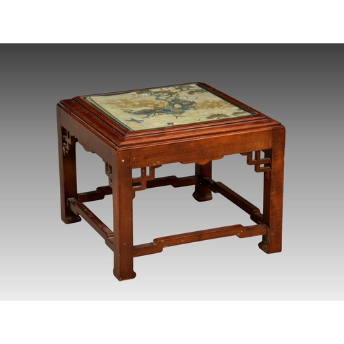 787 - An Oriental stained beechwood occasional table, second half 20th century, the top with painted silk ... 