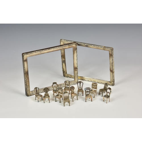 796 - Two boxed sets of six silver plated novelty place card holders by Orchid, 1970s-80s, in the form of ... 