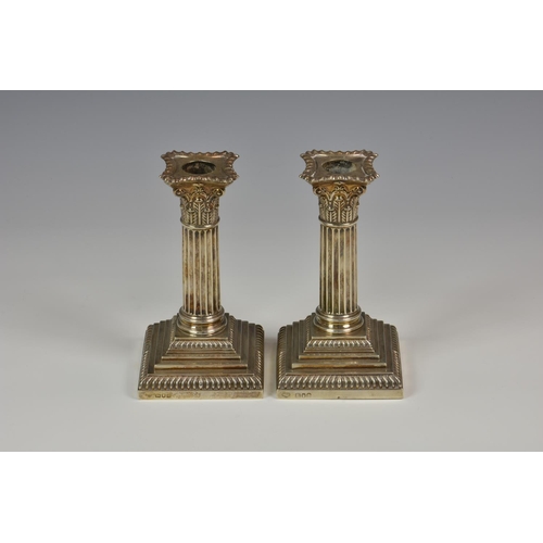 797 - *** WITHDRAWN ***  A pair of Edwardian silver dwarf Corinthian column candlesticks, Goldsmiths & Sil... 