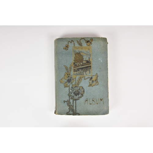 800 - A Victorian / Edwardian and later postcard album, containing 380+ postcards, to include comical.